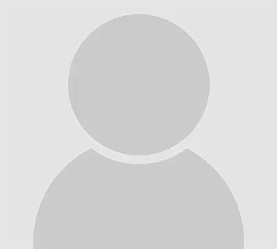 Default profile image silhouette, gray background.